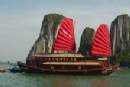 TOURISTS IN Halong Bay on a traditional junk