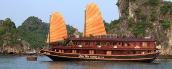 Tourists are enjoying Experience Halong Bay cruise with deluxe Bai Tho Junk - TL104