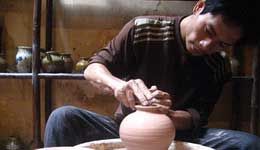 Travelers with Handicraft village tours