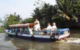 TOURISTS IN Travel by boat