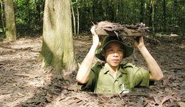 Travelers with Half day Cu Chi Tunnels tour