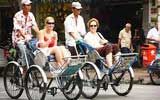 TOURISTS IN Travel by cyclo