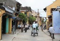 TOURISTS IN Cyclo And Boat Cruise Tour