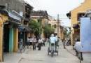 TOURISTS IN Cyclo And Boat Cruise Tour