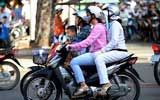 TOURISTS IN Travel by motorbike