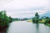 TOURISTS IN Cai river trip in the countryside
